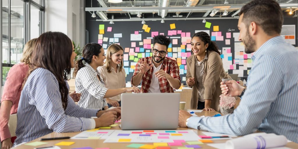 Diverse team collaborating in a modern office environment.