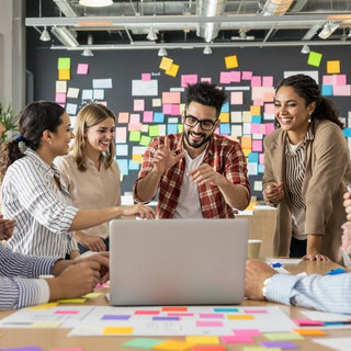 Diverse team collaborating in a modern office environment.