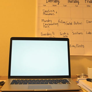 Laptops and notes create a focused writing environment.