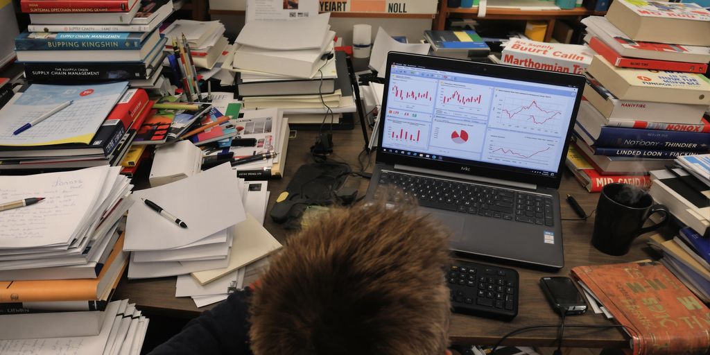 Student confused at desk with supply chain management materials.