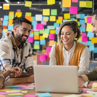 Group collaborating on marketing ideas in a bright office.